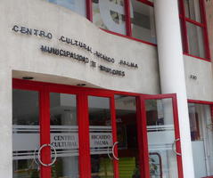 Red-bordered doors at cultural center