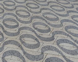sidewalk tiles with wavy pattern and circles between the waves