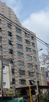 Building with different colors of gray bricks
