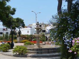 Park with statue and flowers