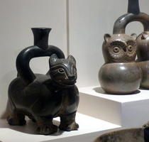 Vessels in form of cat and owls