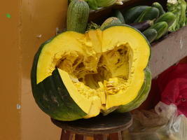 split-open green fruit with yellow interior