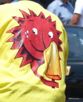Smiling red sun holding a popsicle