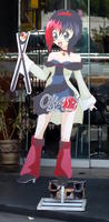 Manga-style girl holding sushi as advert for sushi restaurant