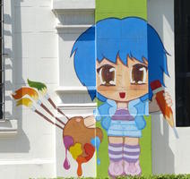 Cartoon girl with paint palette, brushes, and pencil.
