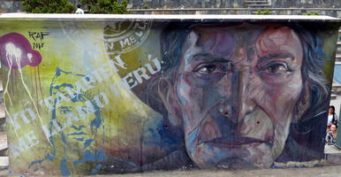 Wall painting of old man; text reads “I am also called Peru”