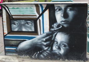 woman and child, with man looking in through window