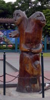 Two-headed wood sculpture