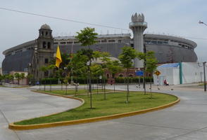 Stadium with large sculpted torch on side