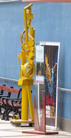 Abstract yellow humanoid sculpture