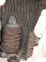 replica of burial area; wrapped bodies