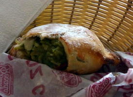 Empanada showing rice inside