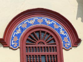 Mosaic atop arched window