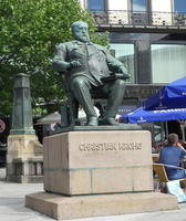 Sculpture of portly seated man (Christian Krohg)