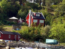 Small red wood cottage