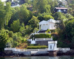 Terraced landscape with house with greek-style columns at top