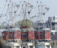 Trio of industrial cranes