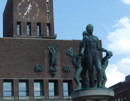 Sculpture of parents holding children’s hands