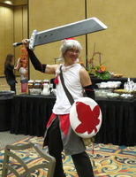 Man carrying shield and very oversized sword