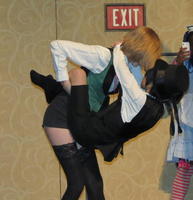 Two people in a semi-acrobatic embrace