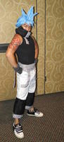 Anime character in sleeveless black shirt with spiky blue hair