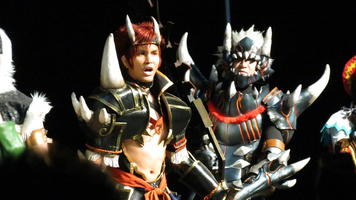 Two warriors with tusks on their costumes