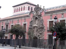 Pink building with relief work in rococo style