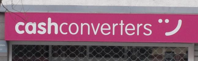 Sign with words “cashconverters” and a smile made of two dots and a skewed arc