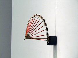 Semicircle of brushes attached to a hub that is motorized