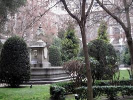Ornamental sculpture with urn on top