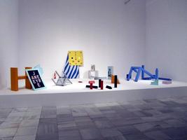 Installation with large letters and parts of books