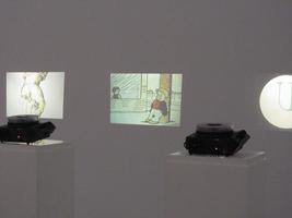 Three slide projectors showing random images; center image is of Nancy and Sluggo (from the comic strip)