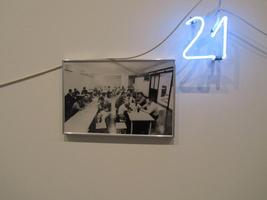 Picture with 21 people and neon number 21