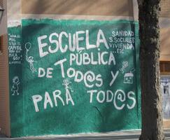 Sign on school reading “Public school of all and for all”
