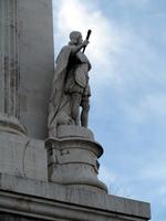 Statue of knight drawing sword