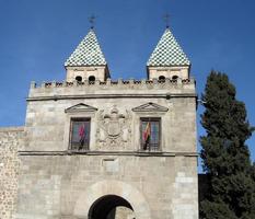 Towers and flags at entrance to city
