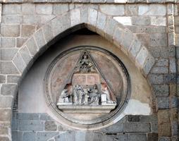 Carving of religious figures inside a triangular shape