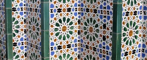 Geometric design tiles on station wall