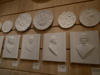 friezes of distinguished looking gentlemen