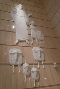 shepherd with children and many sheep