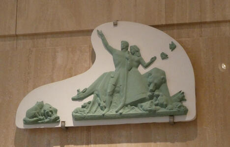 young man with young woman in long dress