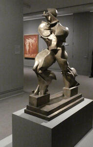 Abstract bronze of striding man