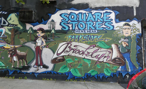 Mural: Woman with dog at left, older man in glasses at right. Text: Square Stores Mens Wear Park Slope Brooklyn
