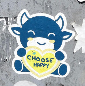 Whimsical cartoon bull holding a heart with text CHOOSE HAPPY