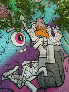 One-eyed blue monster holding an ice cream cone