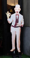Clown in white tails and top hat