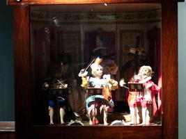 “Monkey band” playing drums, conducting, and playing violin