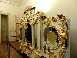 Large ornate reed organ with gold leaf