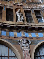 Relief work and statue in ceiling of old train station