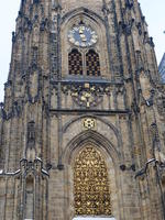 Clock tower with gold leaf arch